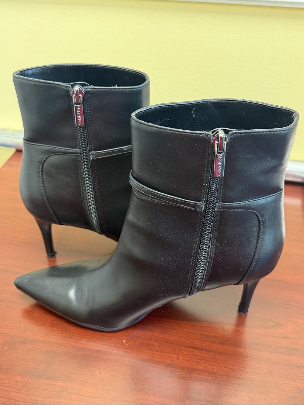 Calvin Klein Black Pointed-Toe Leather Ankle Booties with Side Zip